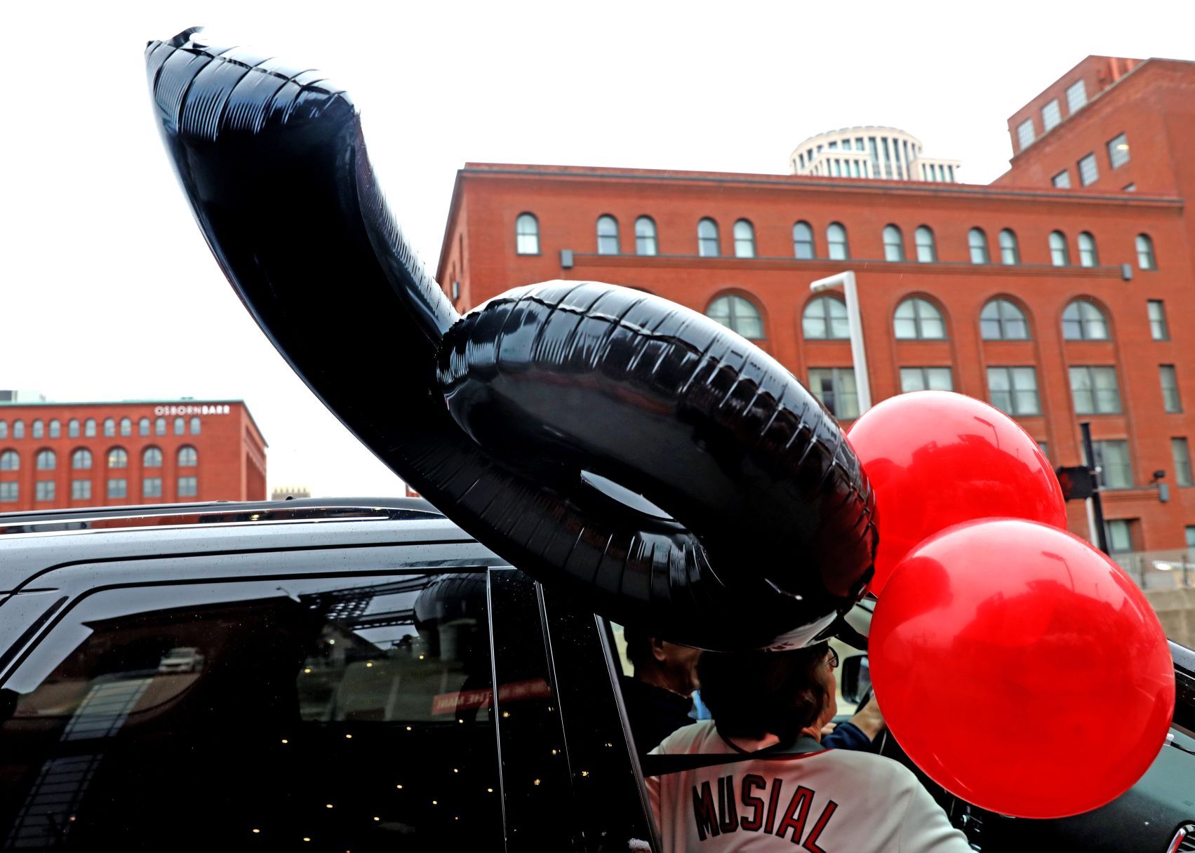 Drive-by parade celebrating 100th anniversary of The Man’s birth